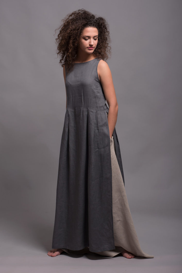 Model wearing a natural flax linen skirt and long tunic, highlighting its breathable and medium-weight fabric.