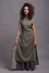 Front view of the linen apron dress LINAS, showcasing the boat neckline and loose A-line silhouette.