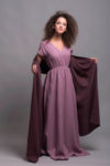 Model wearing a pink long linen dress, perfect for weddings and formal events.