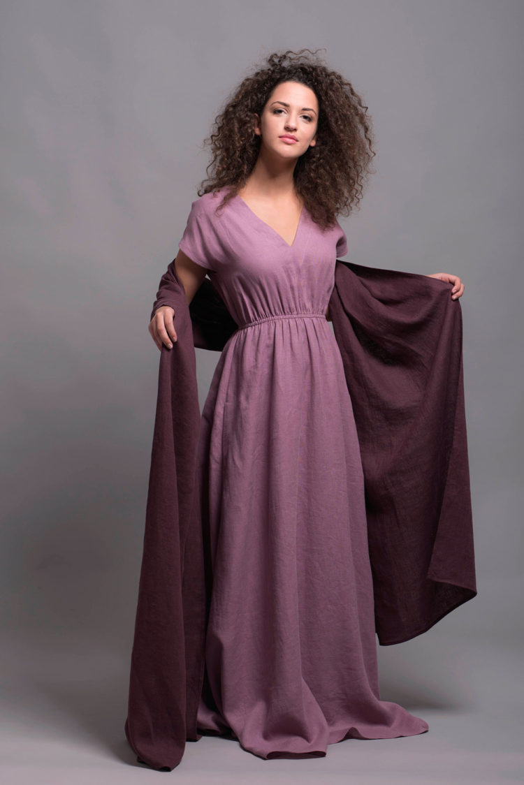 Model wearing a pink long linen dress, perfect for weddings and formal events.