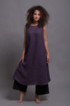 Model wearing the Loose Linen Dress UNA in Royal Purple with a relaxed A-line fit and sleeveless design