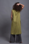 Asymmetrical hemline of the KENI tunic highlighted from a back.