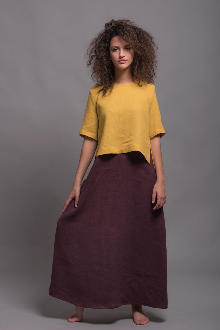 High low hem linen shirt FRIDA displayed on a model, showcasing the asymmetrical design.