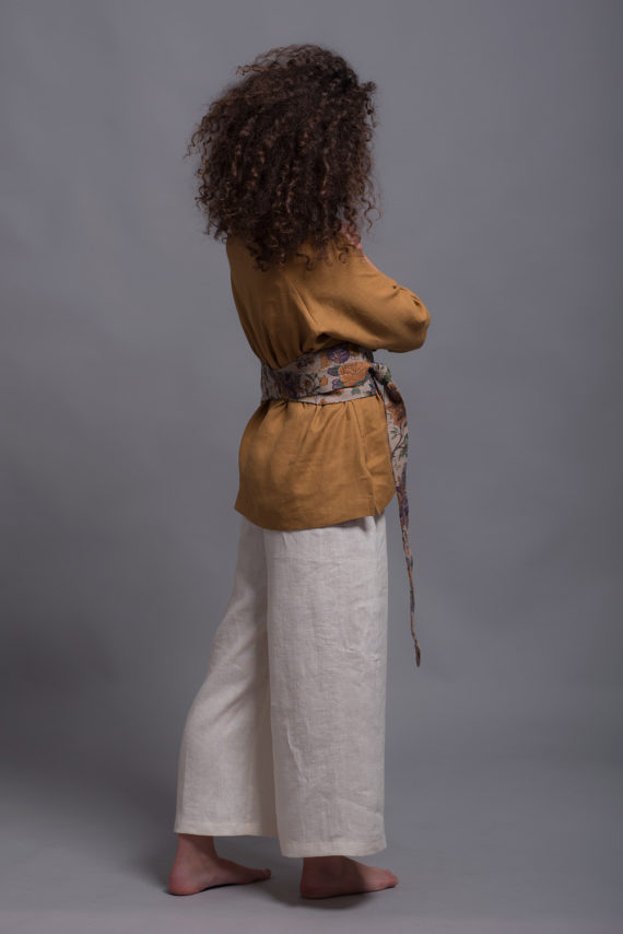 Floral Obi Belt cinching a tunic for a structured silhouette.