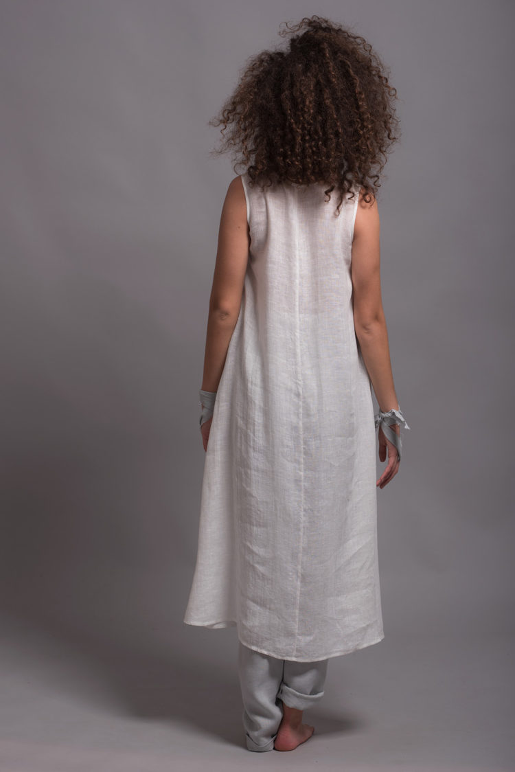Back view of the breathable linen slip dress, perfect for layering or wearing as a nightdress