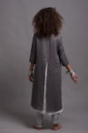 Back view of the Ladies Linen Tunic Dress AYA, emphasizing the high back slit and relaxed fit.