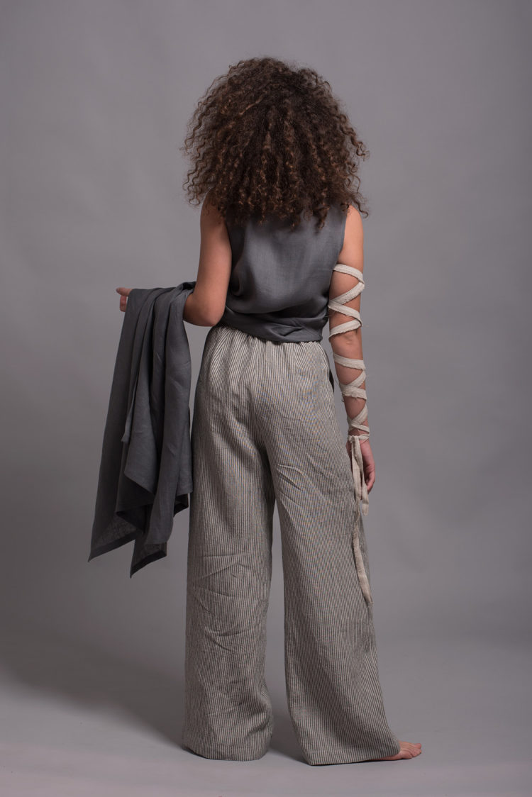 Back view of elastic waist linen pants, offering a comfortable and effortless fit.