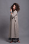 Side view of the Linen Shift Dress NIKA, highlighting the three-quarter length sleeves and hidden side pockets.