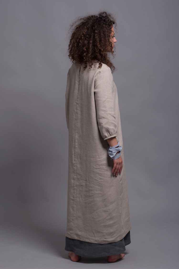 The NIKA dress paired with the gray OLA underdress, showing a layered and modest styling option