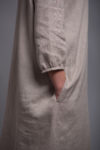 Close-up of the sleeve and medium-weight linen fabric of the NIKA dress.
