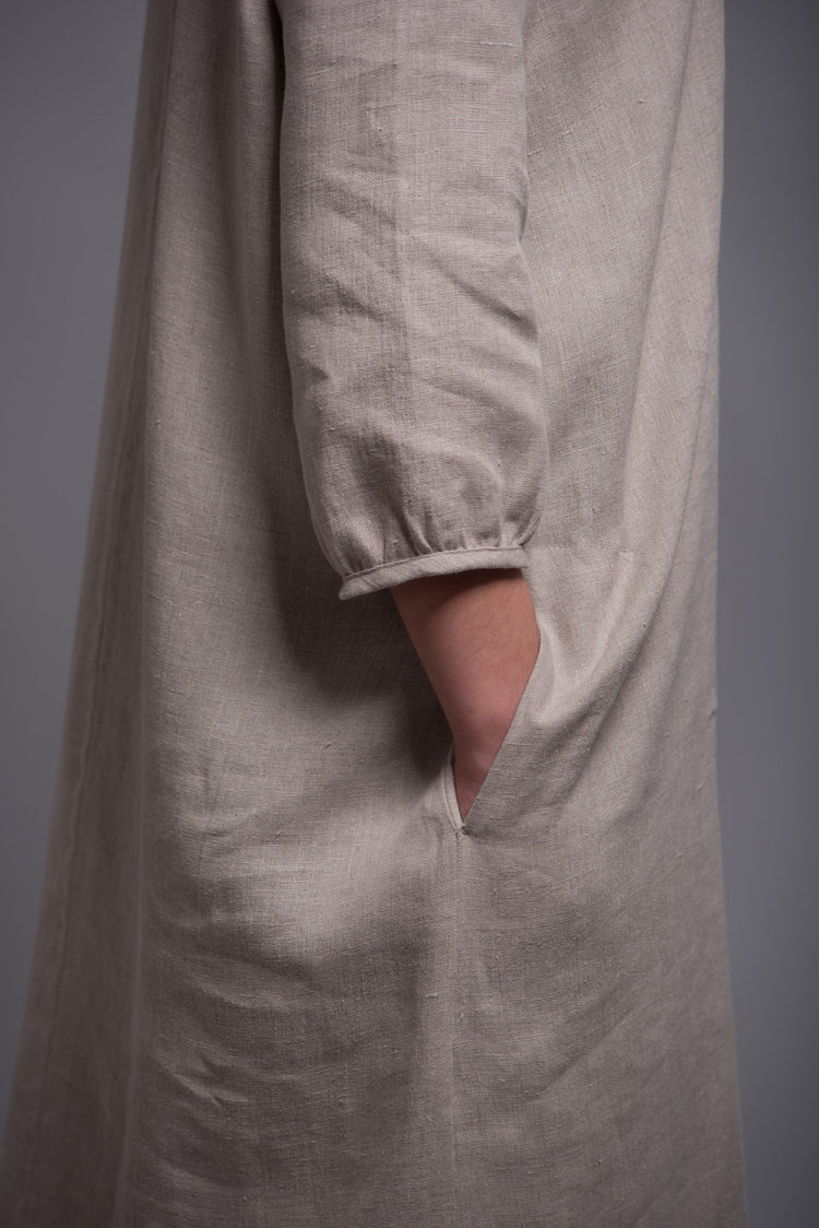 Close-up of the sleeve and medium-weight linen fabric of the NIKA dress.