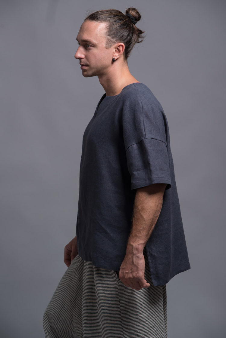 Side view of breathable summer top for men with a slit neckline