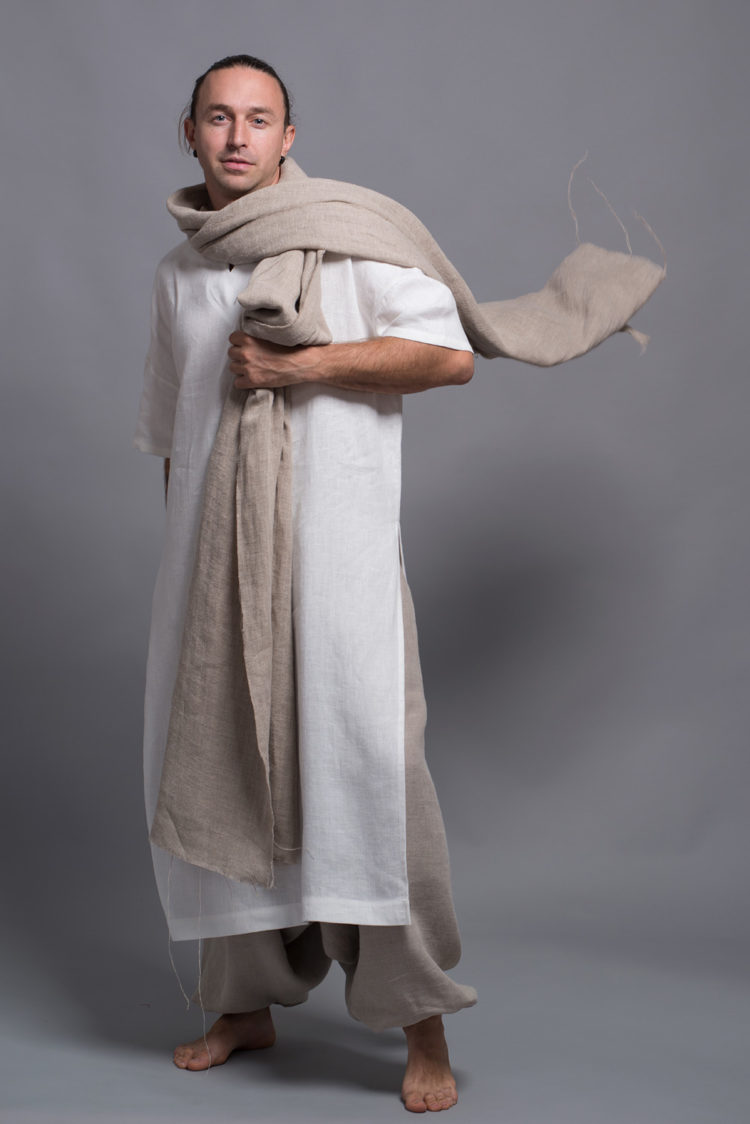 Extra-long linen shawl elegantly wrapped around the , paired with linen kaftan for men