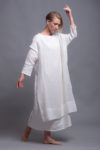 Side view of the SANGA tunic, highlighting the high side slits and asymmetrical hemline.