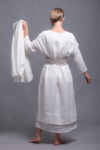 Back view of the SANGA tunic in open-weave white linen, emphasizing its breathable fabric.