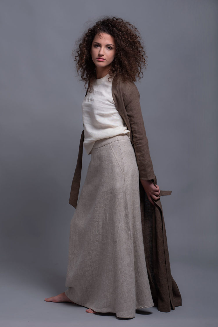 Model wearing a warm linen maxi skirt, styled with a cozy linen long jacket for fall.