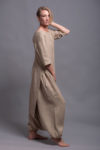 Side profile of the JIVA pants showcasing the relaxed fit and flowing silhouette