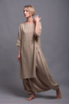 Side profile of the JIVA pants showcasing the relaxed fit and flowing silhouette