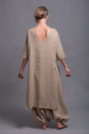 V-shaped open back of the MIRA tunic adding a unique and stylish touch.