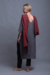 Back view of the MIRA tunic showing the V-shaped open back and relaxed fit