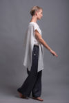 Lightweight and breathable linen fabric shown in detail on the outer layer of the top.