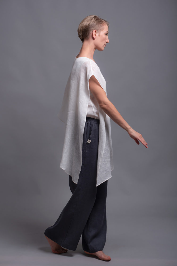 Lightweight and breathable linen fabric shown in detail on the outer layer of the top.