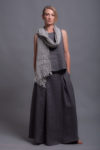 Timeless floor-length linen skirt styled with scarf for a transitional outfit.