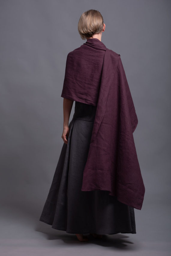 Extra-wide linen shawl elegantly wrapped around the neck