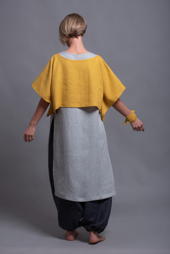 Back view of the DION linen top, displaying the smooth, breathable linen fabric.