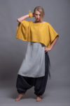 Model wearing the linen lagenlook top DION layered over a tunic for a modern outfit.