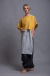 Front View of the round neckline on the DION top, emphasizing minimalist design details.