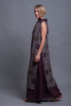 Side view of a long linen vest featuring high side slits for elegant movement.