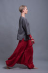 Side view of the long sleeve linen blouse with small side slits, highlighting the loose fit.