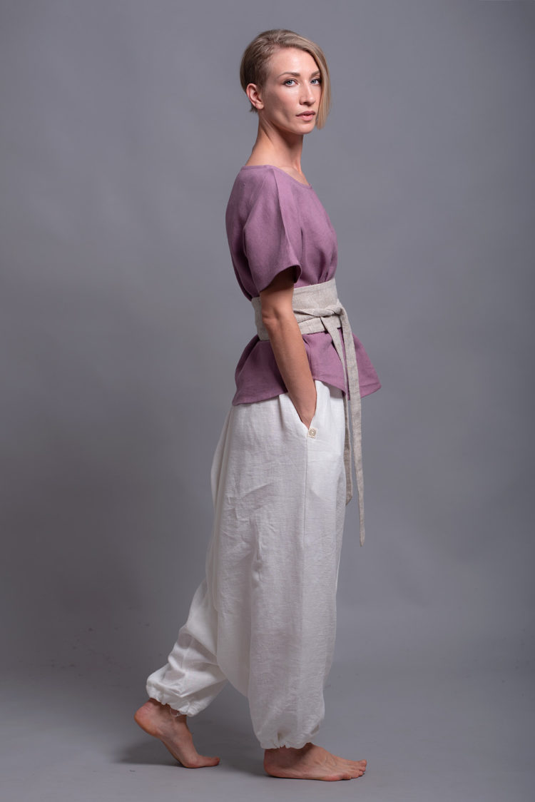 Relaxed-fit linen trousers, designed for movement and breathability in warm weather.