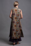 Back view of the Long Linen Vest GAYA showcasing its straight cut and elegant length