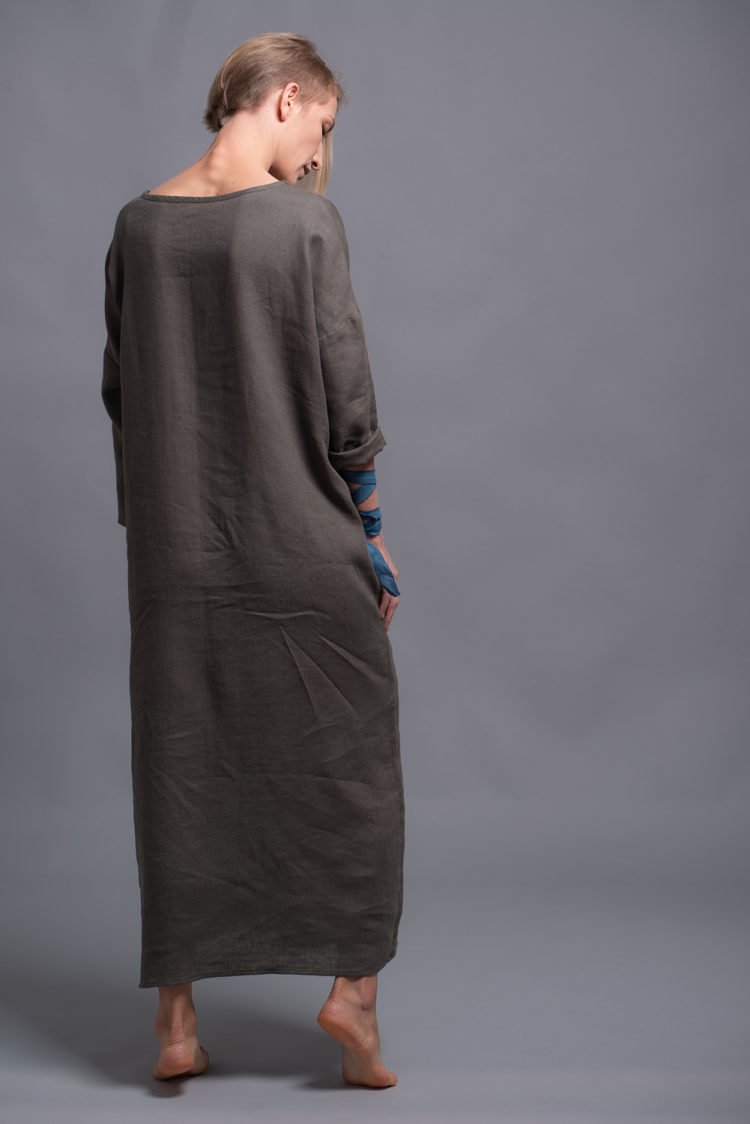 Back view of the women's long linen dress showcasing its airy and loose fit
