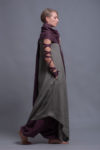 Side view of the Maxi Linen Tunic Dress YUCCA, highlighting its flowing design and modern hemline.