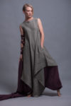 Model showcasing the relaxed fit and asymmetrical hem of the Maxi Linen Tunic Dress YUCCA.