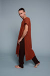 Side profile of men’s tunic with side slits for ease of movement
