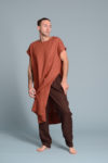 Minimalist men’s long tunic styled with linen pants