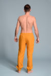 Back view of men’s natural linen pants with relaxed fit