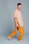 Side profile of a casual linen tunic for men in natural fabric
