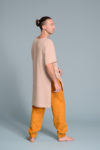Long linen tunic for layering, styled with casual trousers