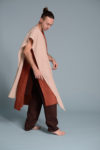Versatile unisex linen scarf styled casually over a men's linen tunic.