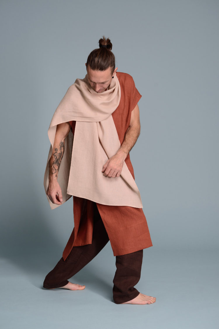 Close-up of breathable linen fabric showcasing the soft texture of a men's linen scarf.