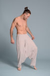 Folded linen harem pants, highlighting the soft and breathable natural linen fabric