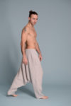 Side view of breathable linen harem pants with a drop crotch design for ultimate comfort