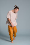 Side view of lightweight linen tee with a classic crew neckline