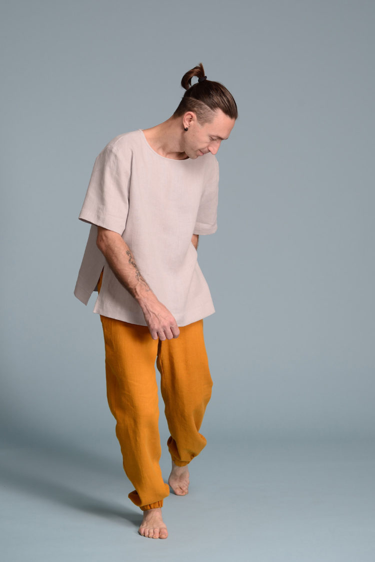 Side view of lightweight linen tee with a classic crew neckline