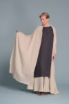 Model wearing oversized lightweight linen shawl in Light Natural Flax